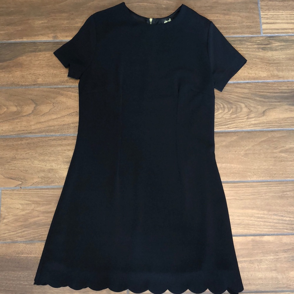 Black dress with scalloped bottom